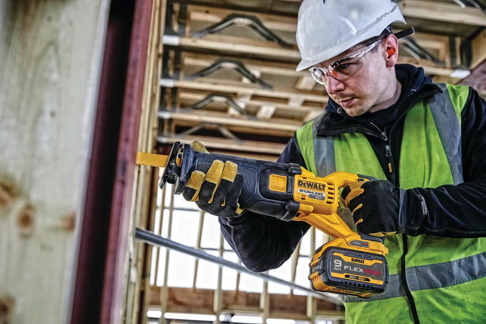 FLEXVOLT brushless cordless reciprocating saw being used by person.