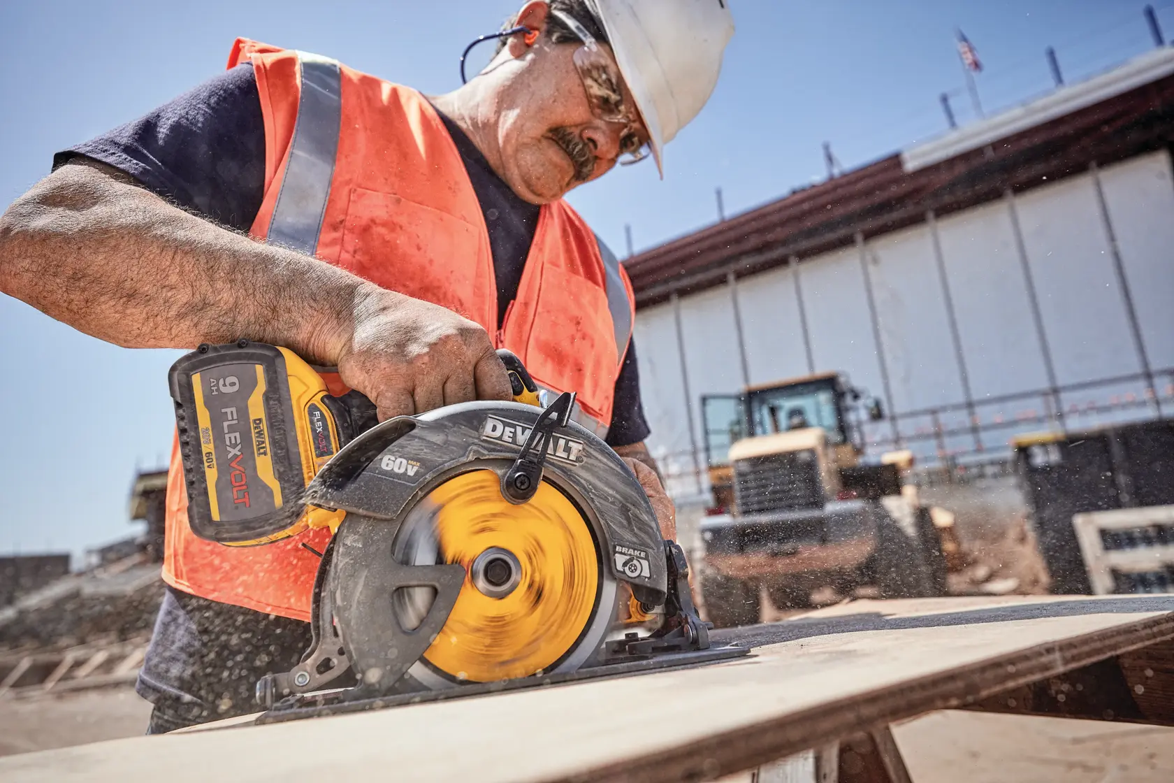 FLEXVOLT brushless cordless circular saw with brake kit being used by person to cut wood.