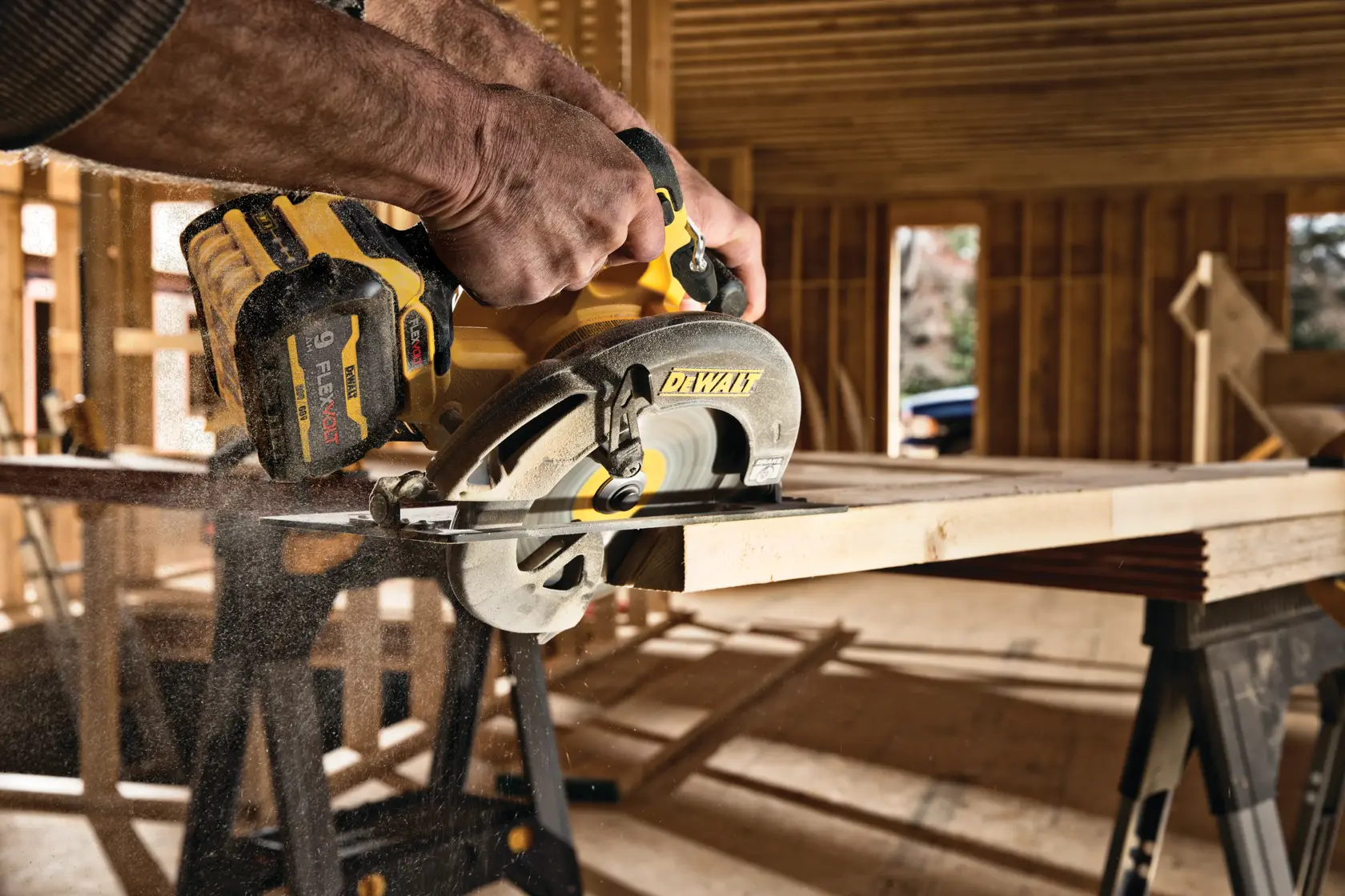 FLEXVOLT brushless cordless circular saw with brake kit cutting wood at an angle.