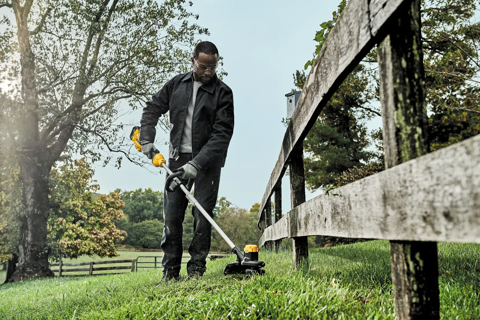 low angle view of Cordless String Trimmer being used.