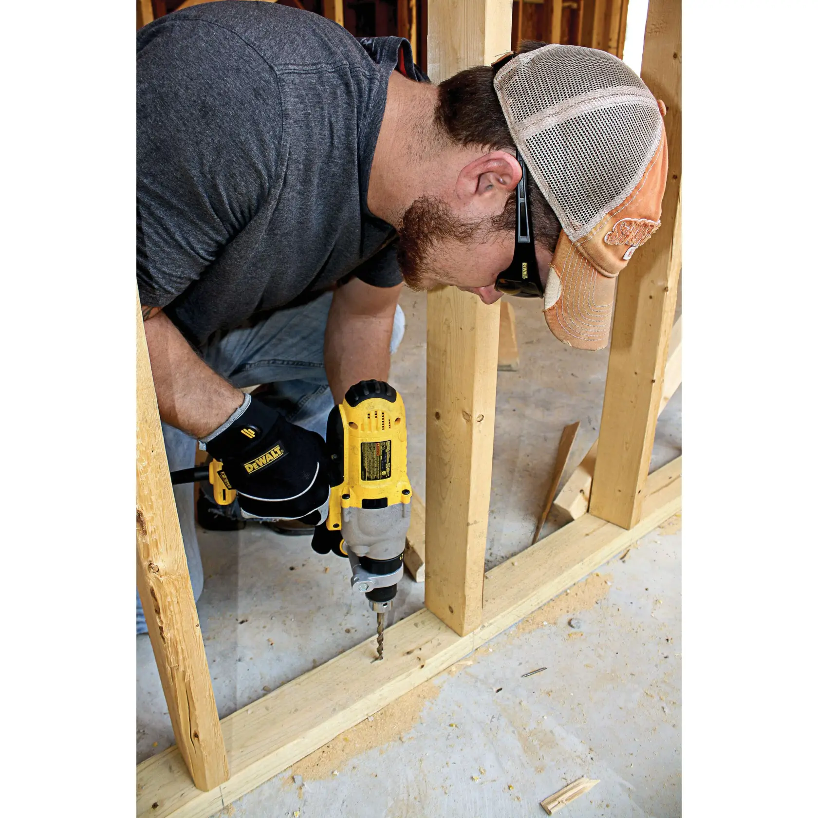 DEWALT Auger protective eyewear being worn by a person using a power tool