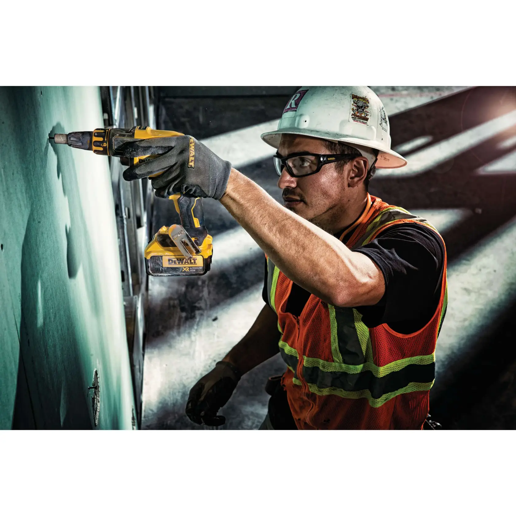 DEWALT ultradex smooth nitrile dip work gloves being worn by a person using a power tool.