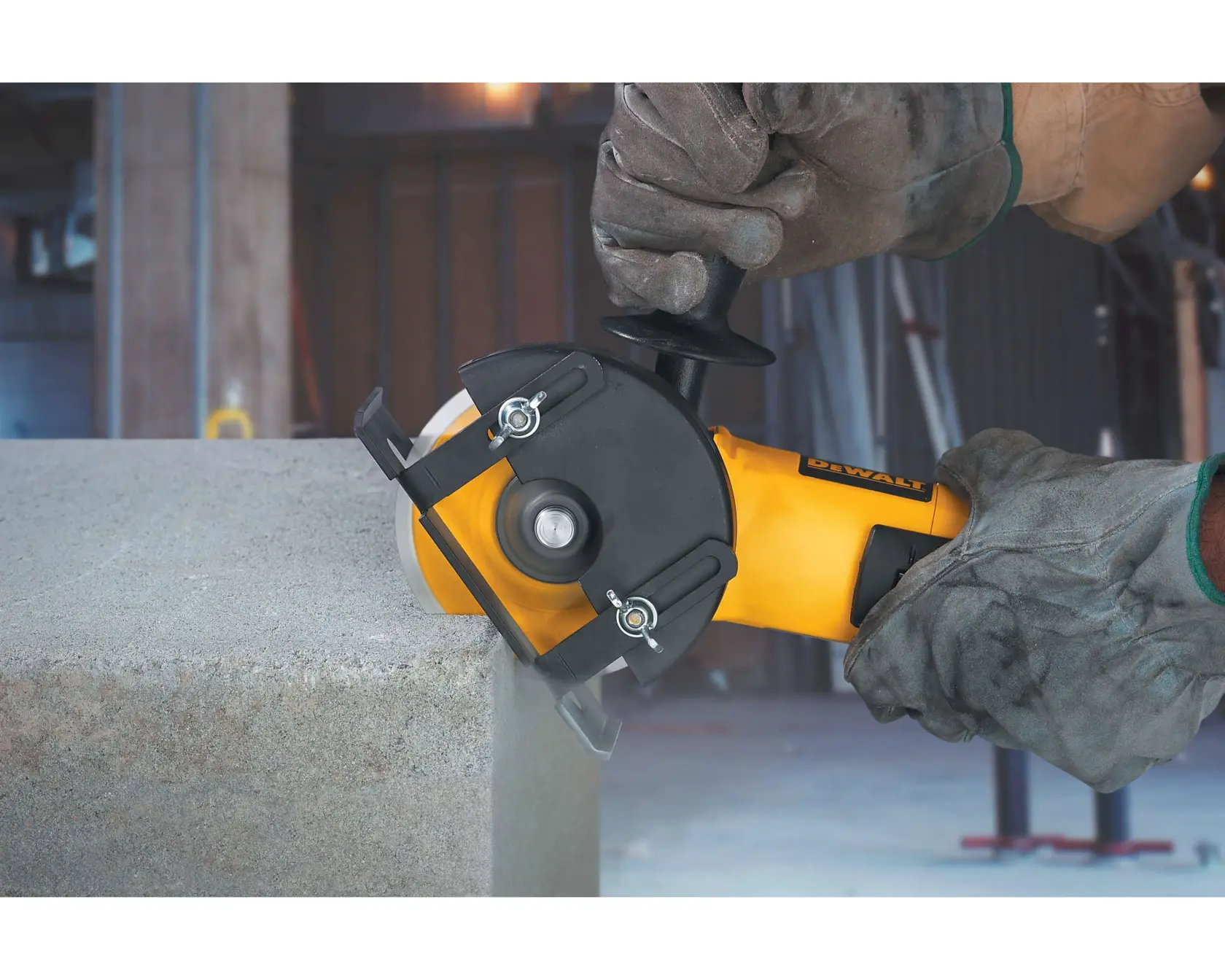 114 millimeters X P segmented blade attached to a tool cutting through a block of concrete.