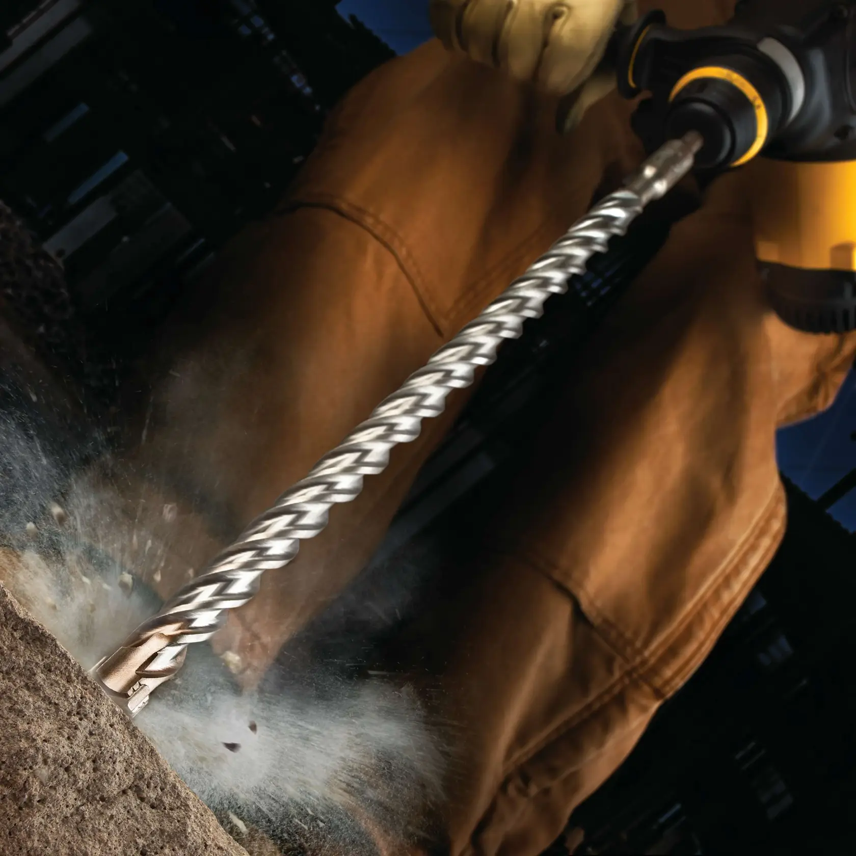 Three quarters inch by 16 inch by 18 inch HIGH IMPACT Teeth CARBIDE S D S Plus Drill Bit in action.