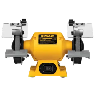 A DEWALT DW756 bench grinder with a yellow body, two grinding wheels, clear protective shields, and a power switch on the base.