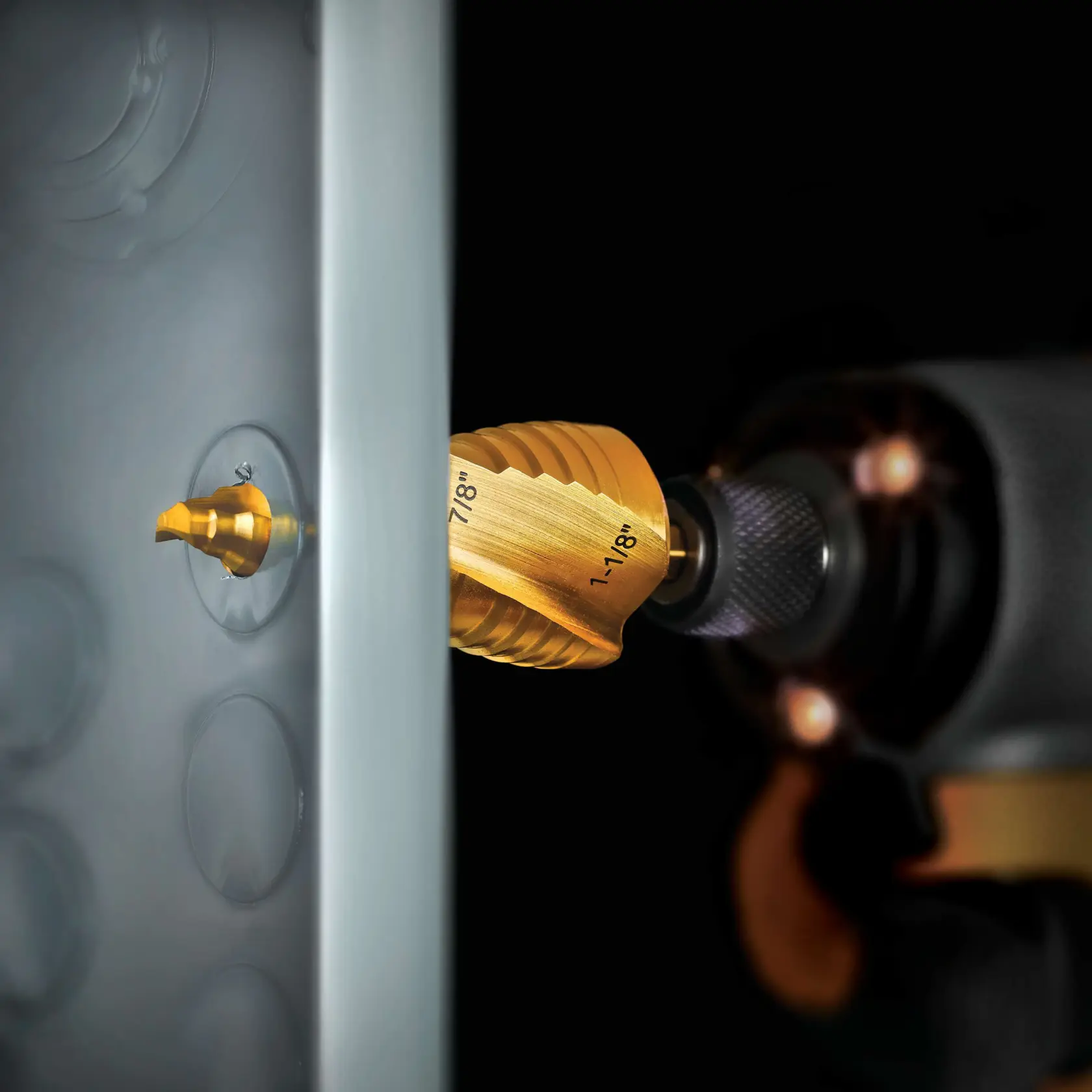 High speed steel 2 step drill bit in action.