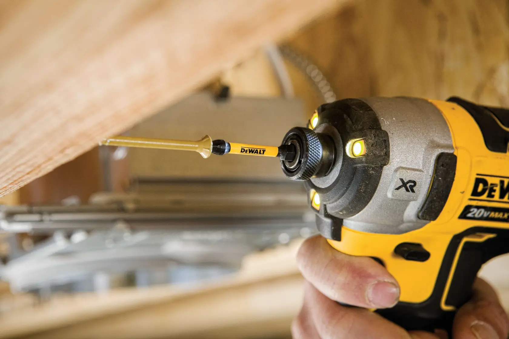 Flex Torq IMPACT READY Screwdriving Bit fixed to power tool screwing wood.