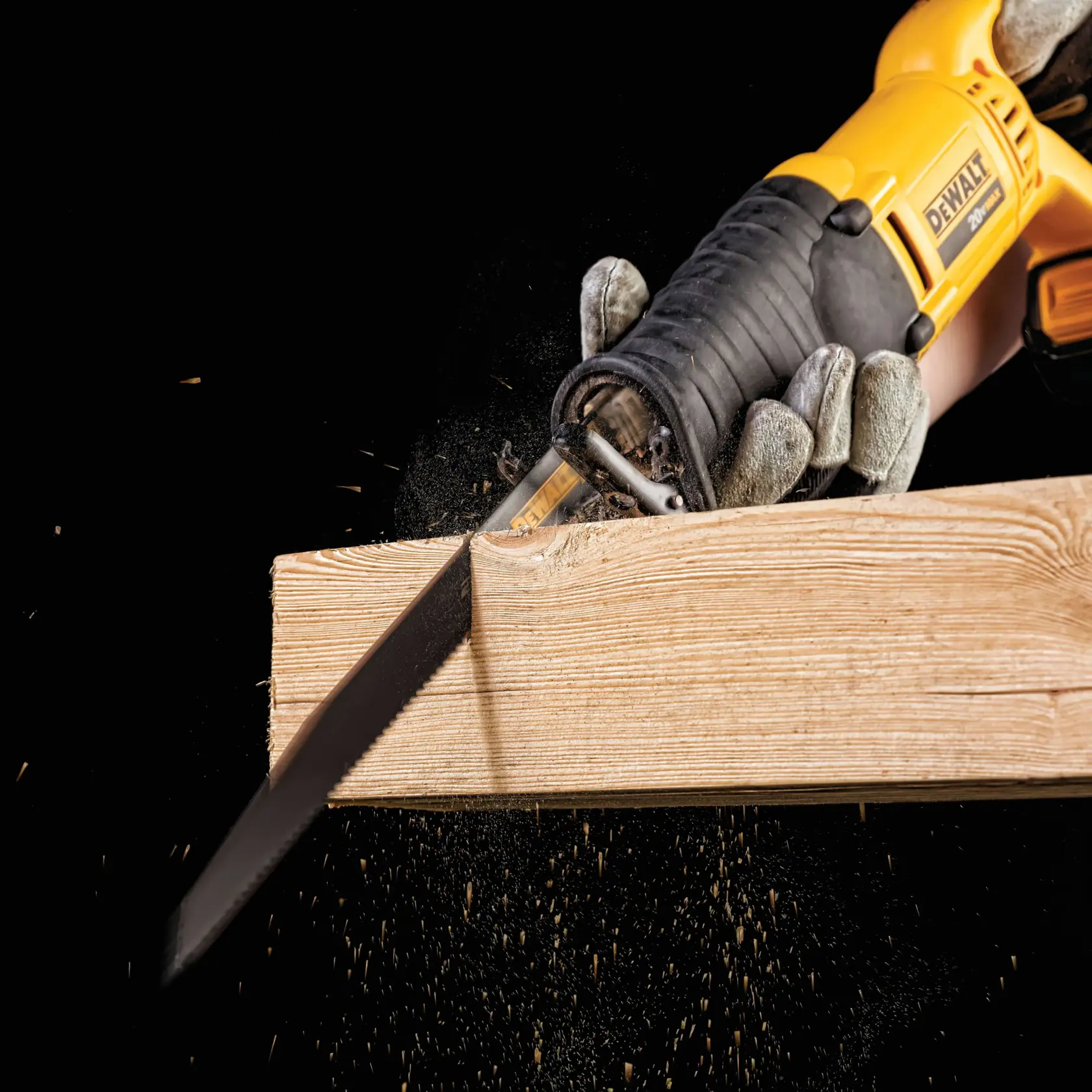 Long Life Wood Cutting Reciprocating Saw Blade being used to slice a wooden plank.