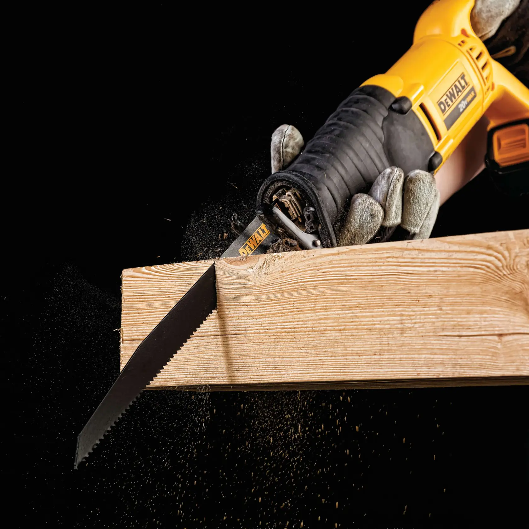Long Life Wood Cutting Reciprocating Saw Blade being used to slice a wooden plank.