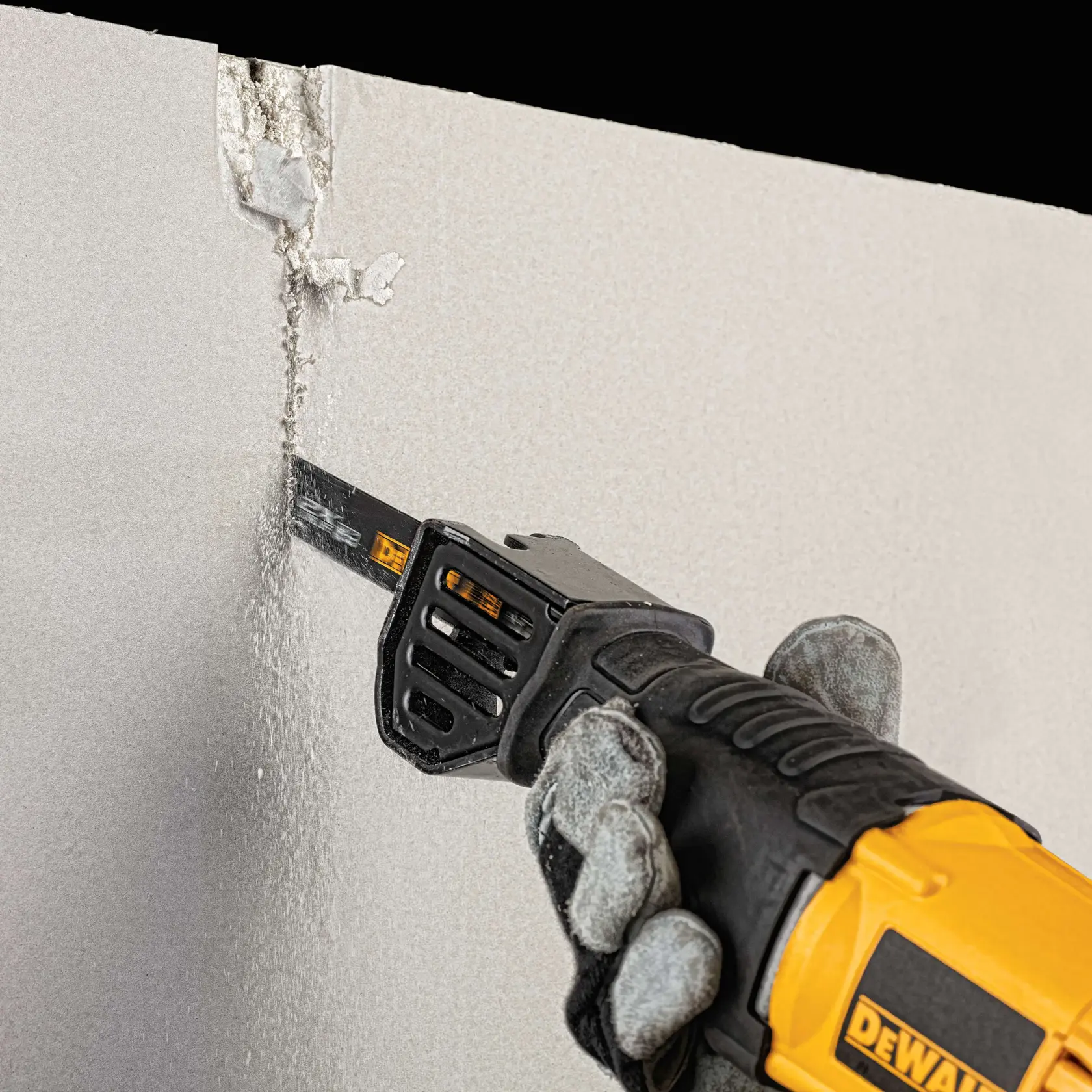 Long Life Wood Cutting Reciprocating Saw Blade being used on a wall.