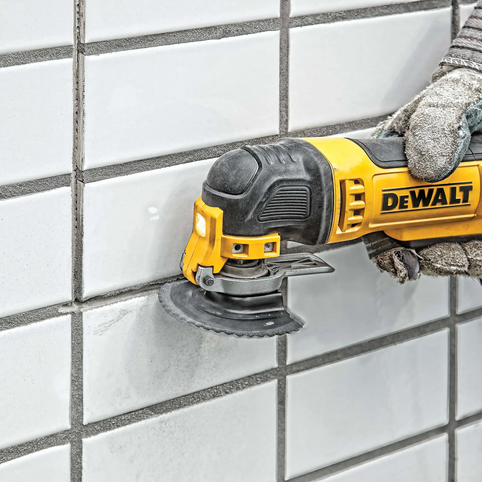 Grout Removal Blade being used on tiles.