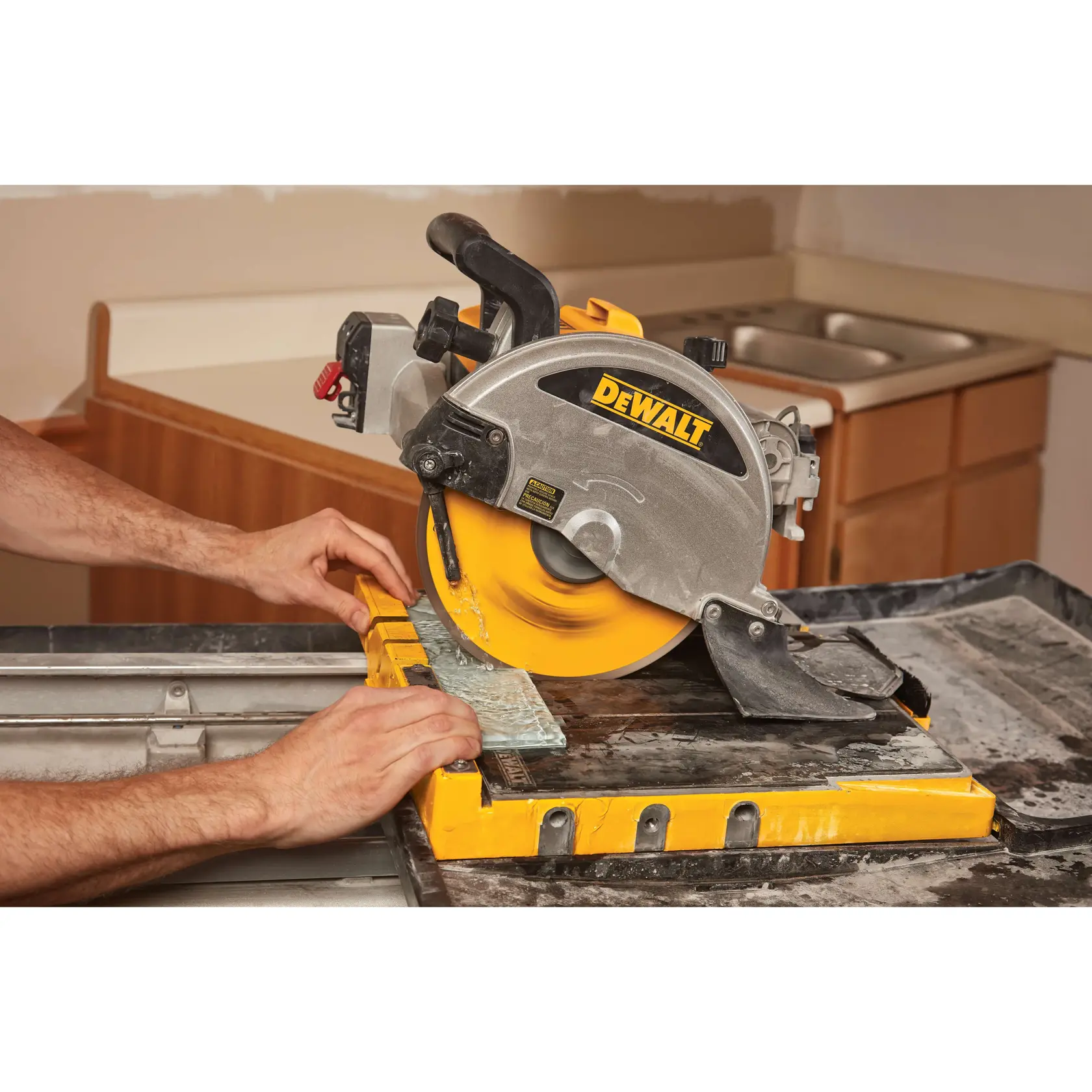 Overhead view of X P 4 Glass tile blades cutting glass tile.rnrnrn