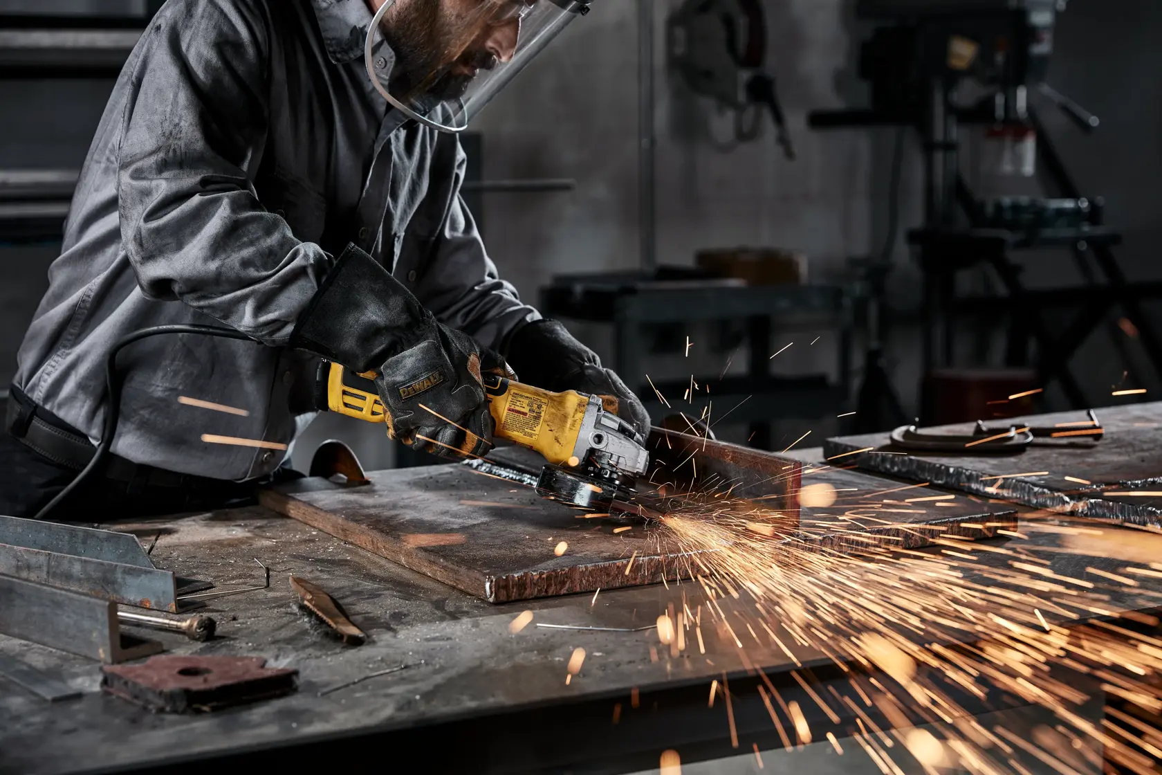 User shown grinding metal with Elite Series Grinding Wheel