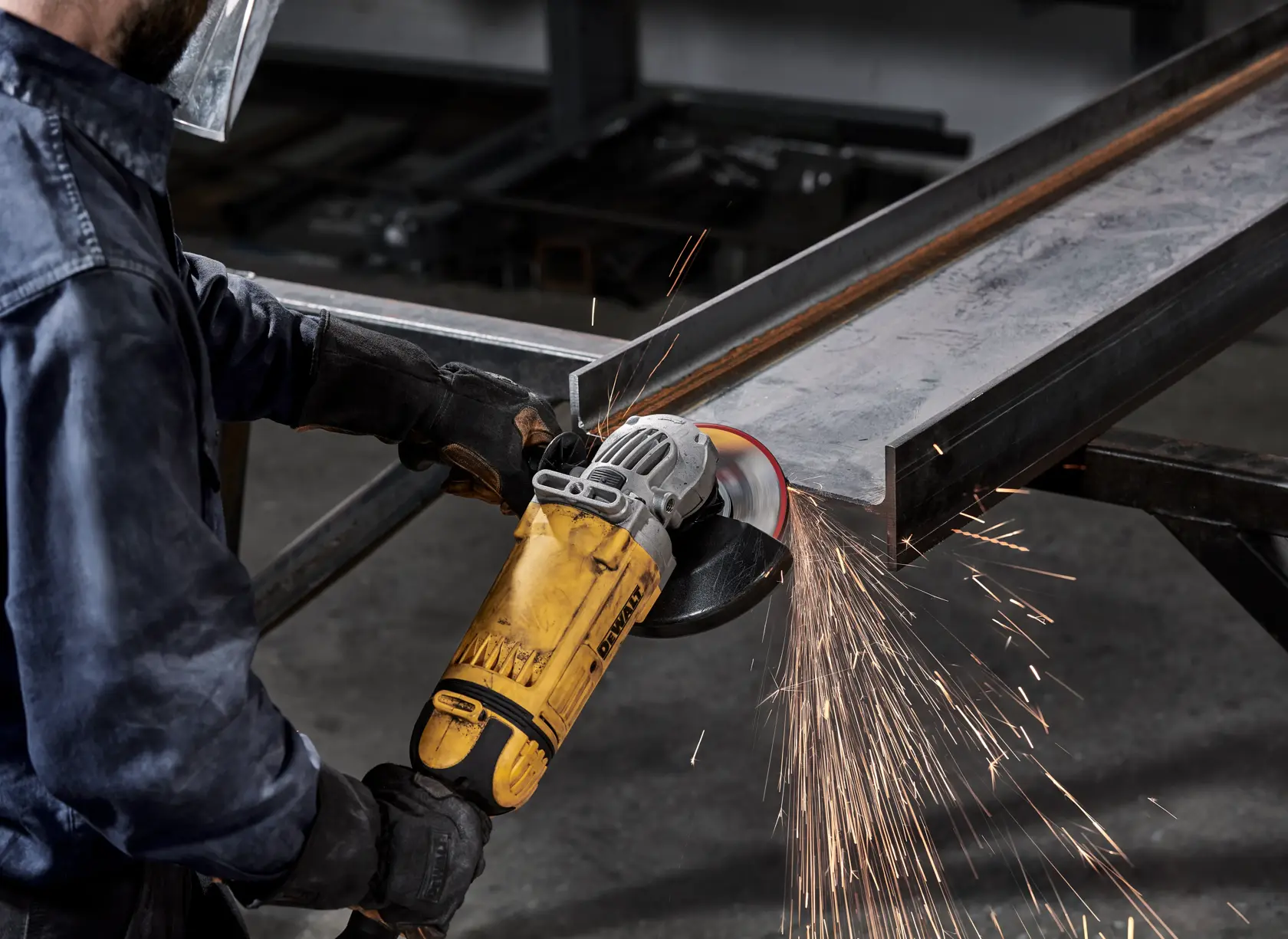 User shown grinding metal using Elite Series grinding wheels 