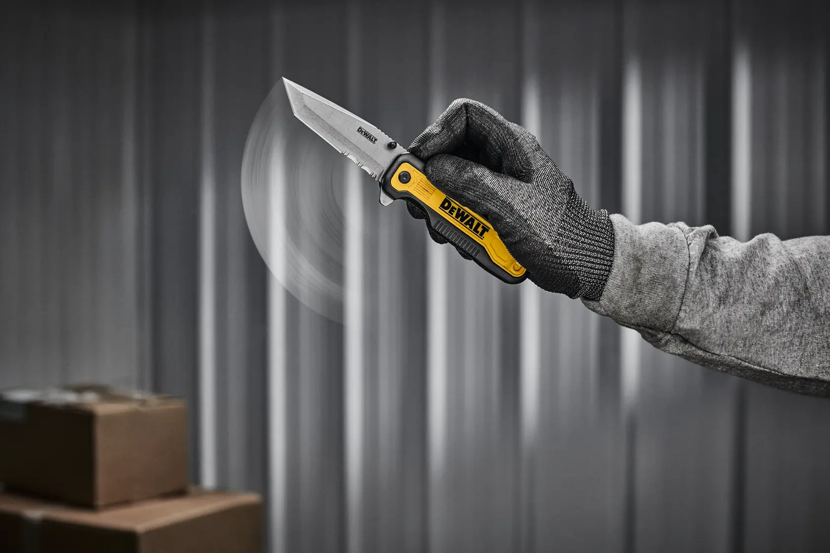 DEWALT pocket knife being flipped open with one handed push to release