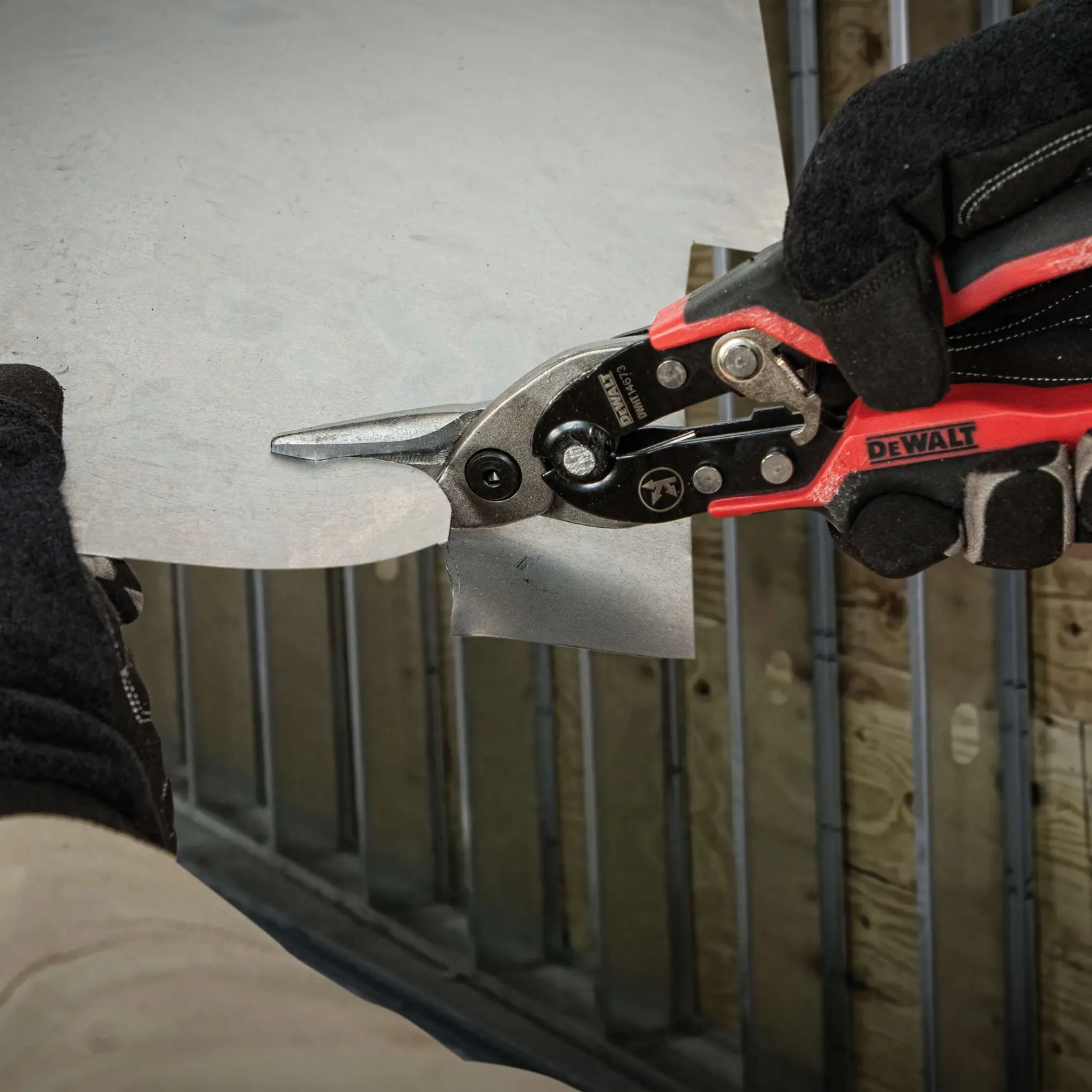 Left Cut Ergo Aviation Snip being used to cut sheet metal.