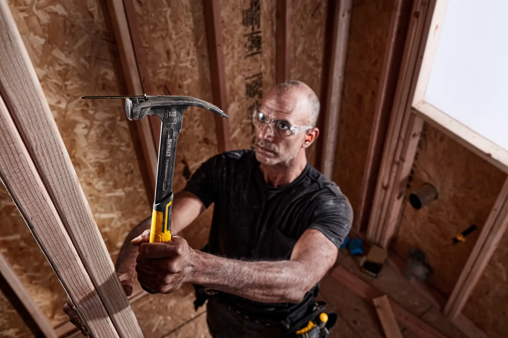XP 1 Piece Steel MIG Weld Nailing Hammer being used by a person with nail.