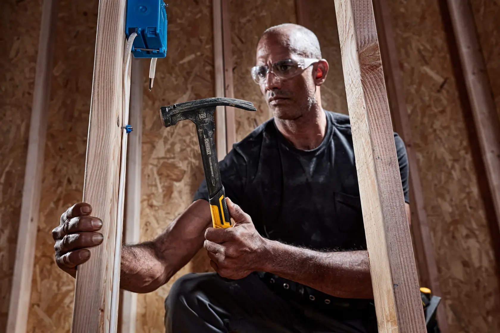 XP 1 Piece Steel MIG Weld Nailing Hammer being used by a person on wood.