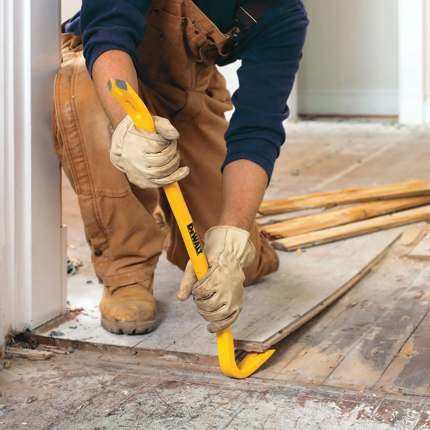 24 inch Wrecking Bar being used on wooden flooring.