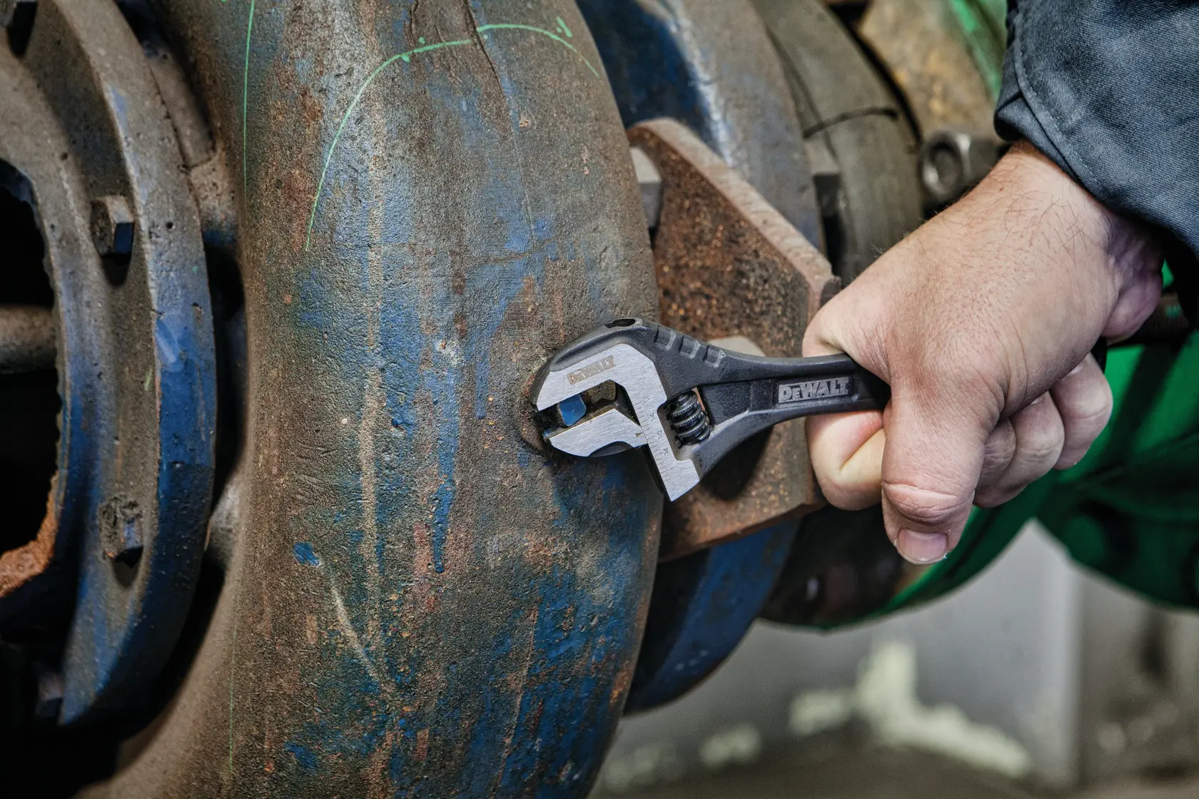 Close up of  8 inch All Steel Adjustable Wrench being used to adjust screws.