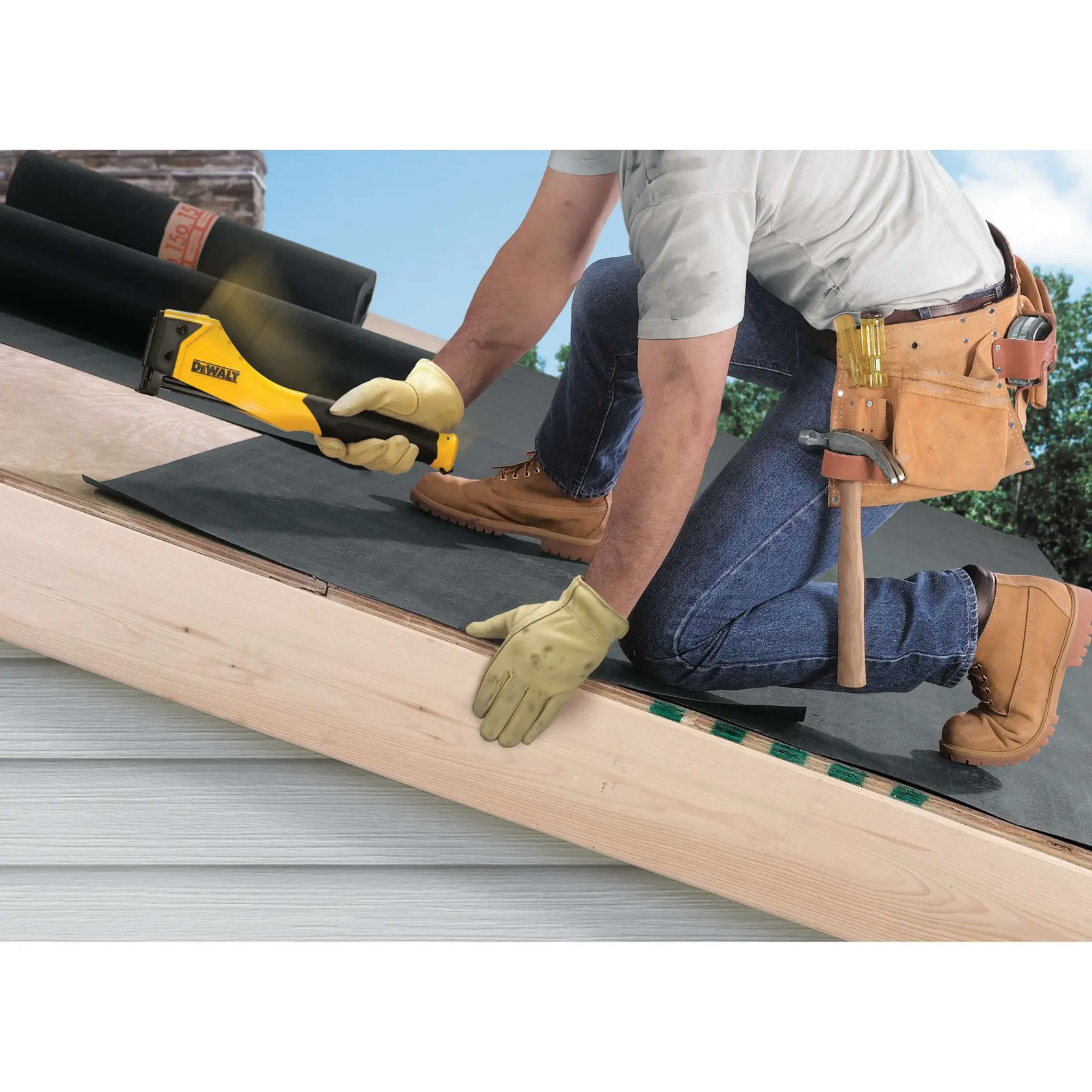 Heavy Duty Hammer Tacker being used by a workman on a construction site.