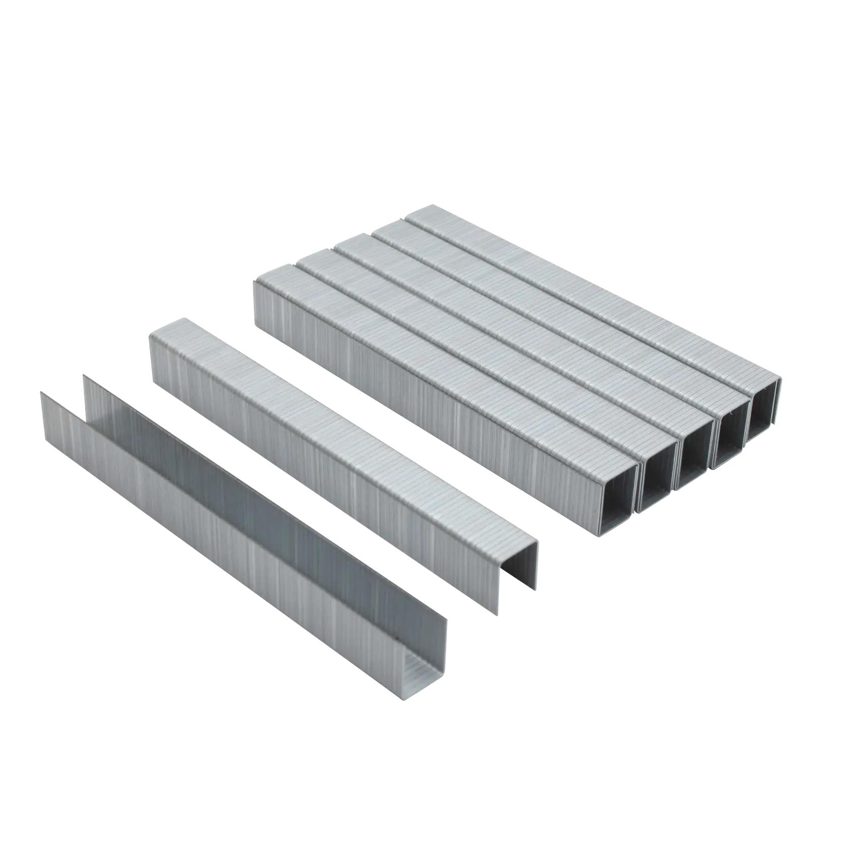 Several stacks of silver metal staples arranged on a white background.