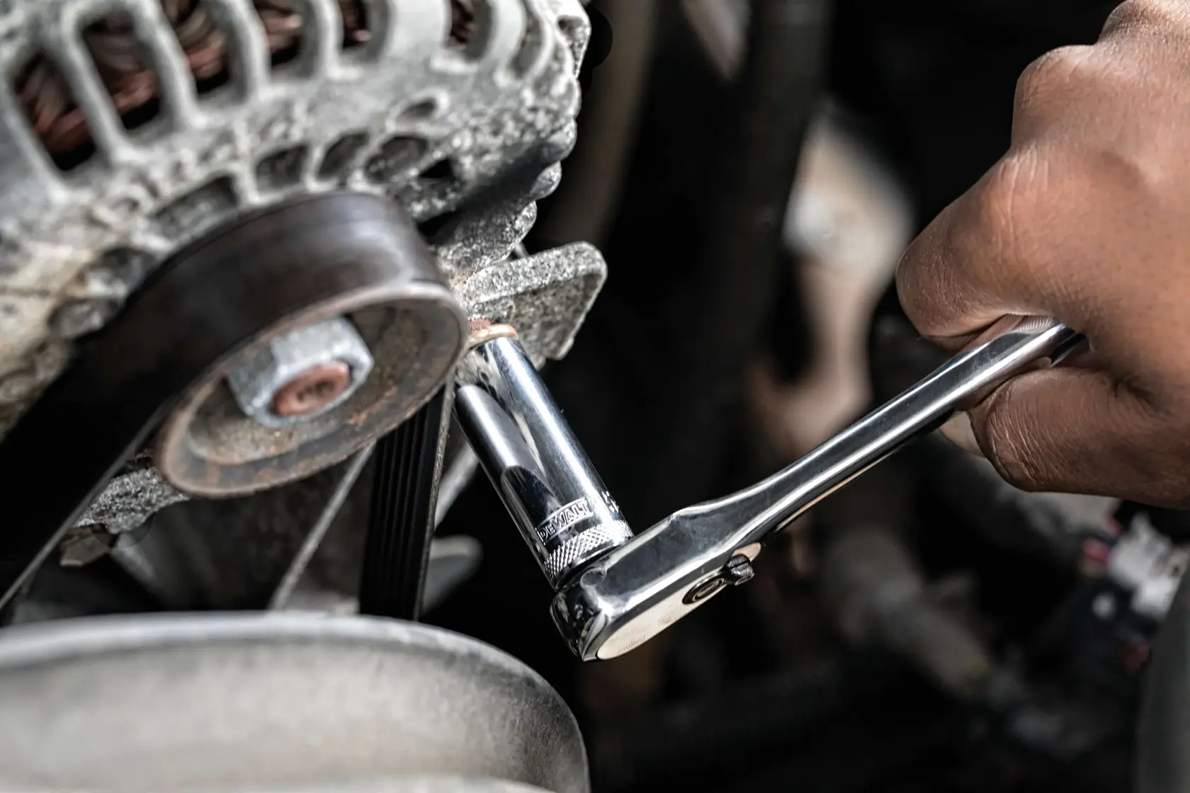 84 piece mechanics tool set being used on machinery.