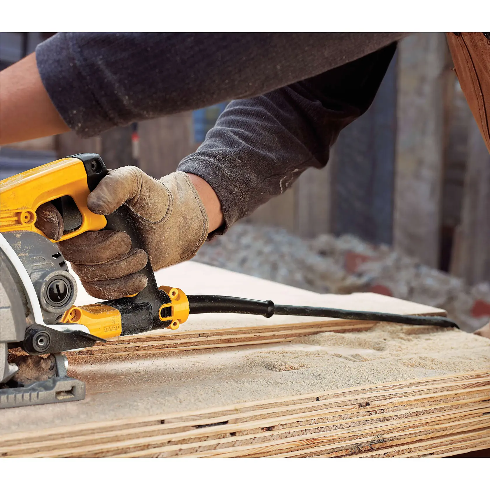 Worm drive circular saw with electric brake being used to cut wood.