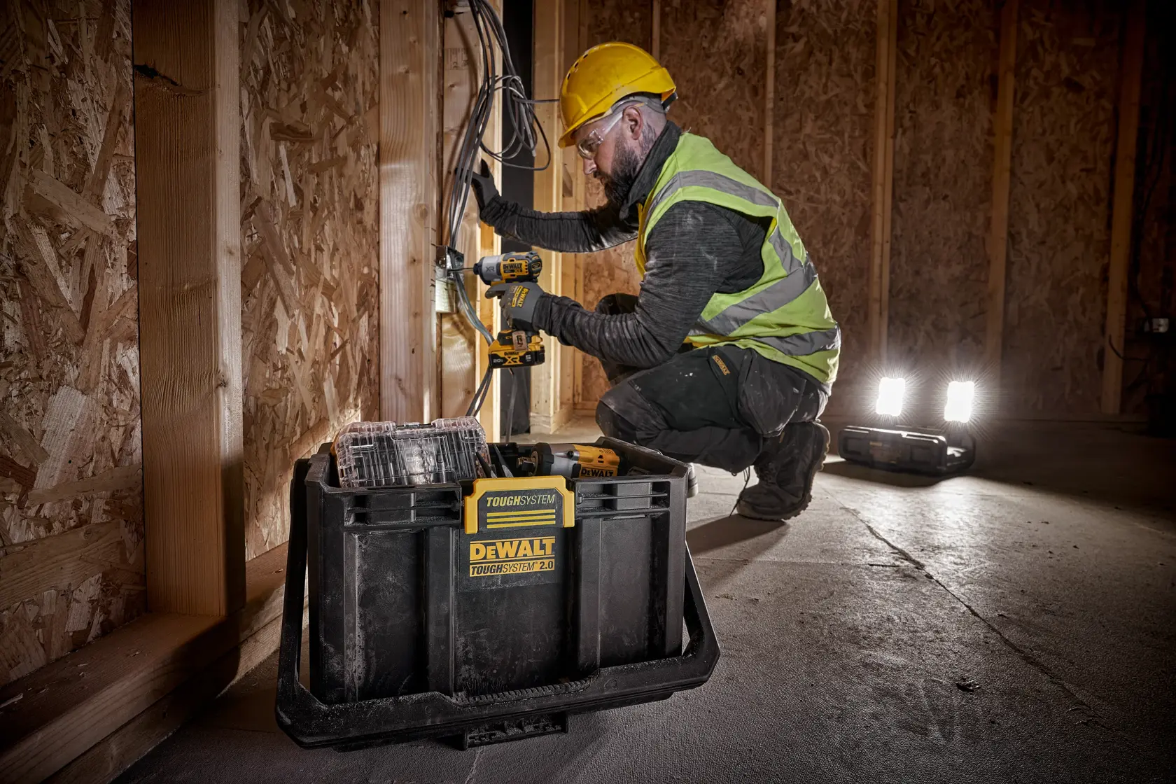 TOUGHSYSTEM 2.0 Adjustable Work Light in use and Storage tote 