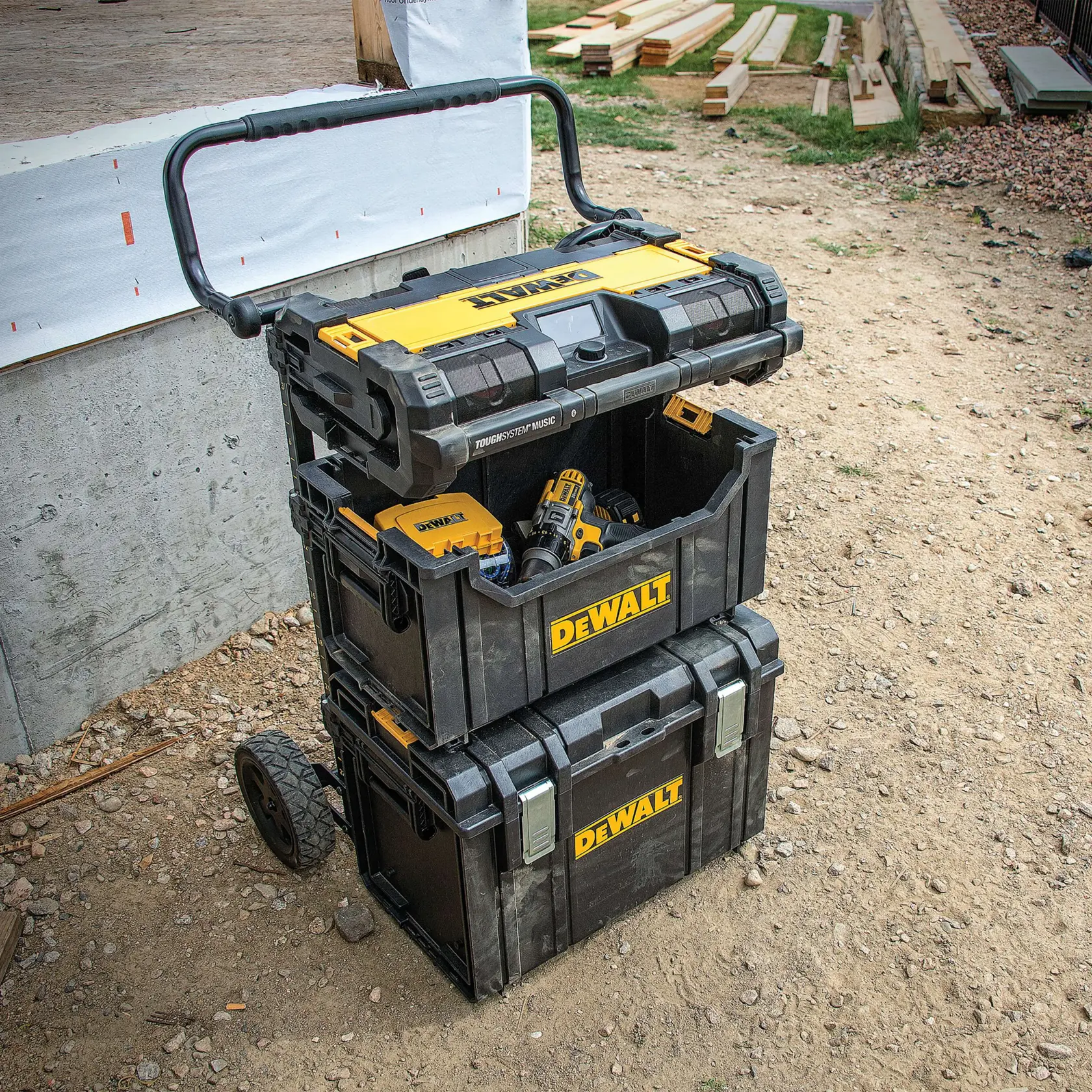 tough system tote filled with tools being carried by a worker.