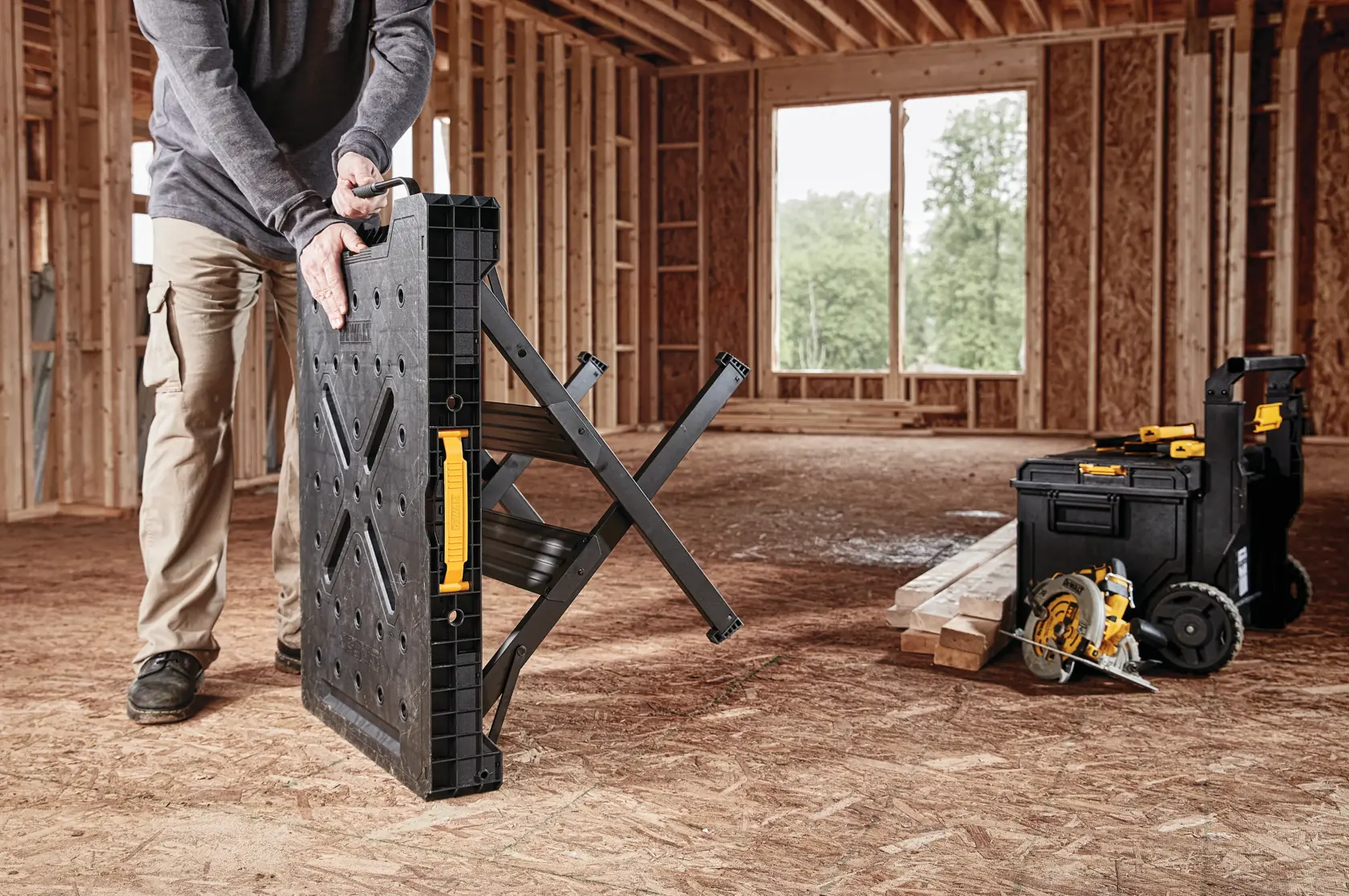 Express folding workbench being set up for use at a worksite.