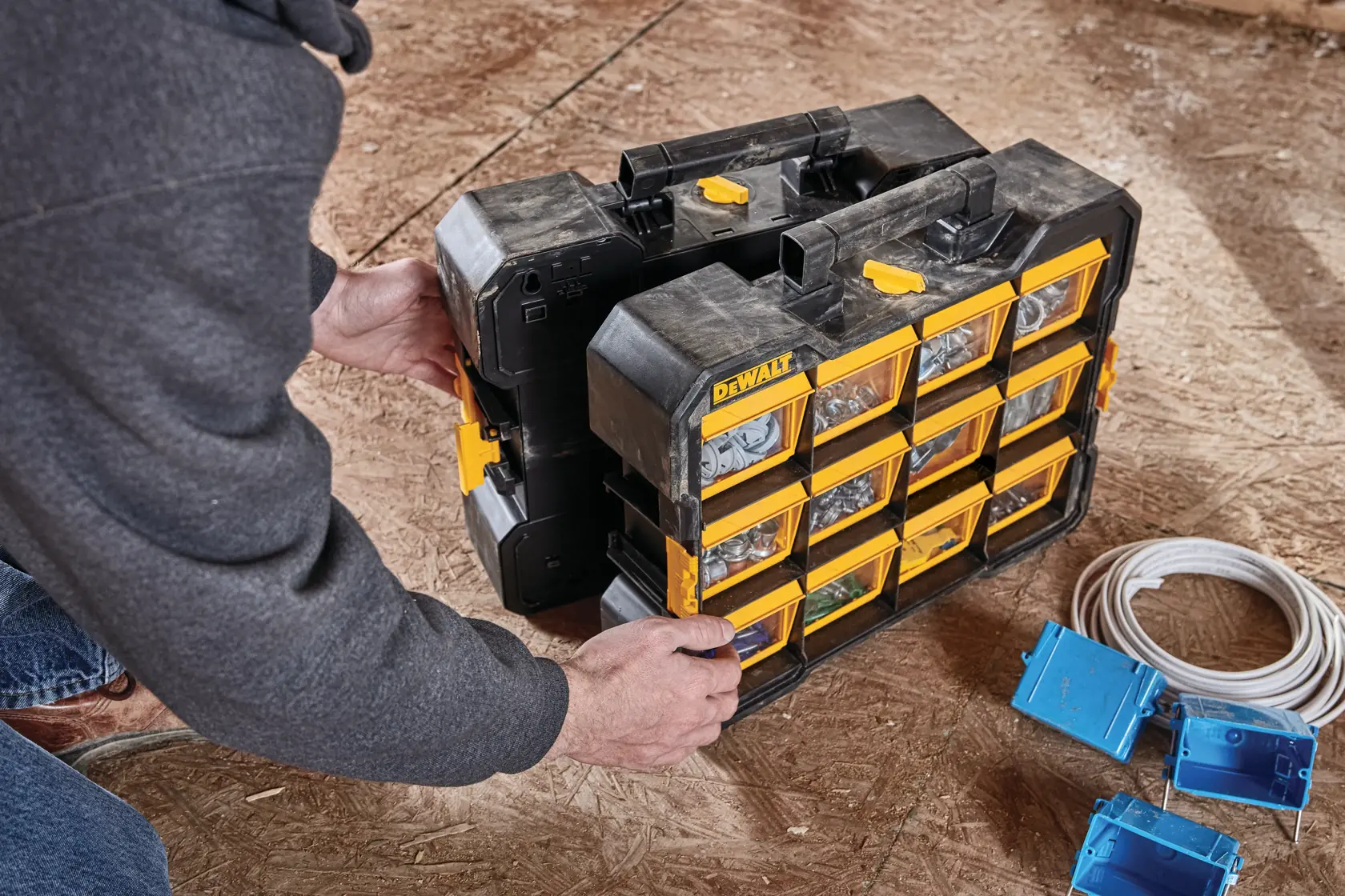 Two flip bin organizers being connected through side latch.