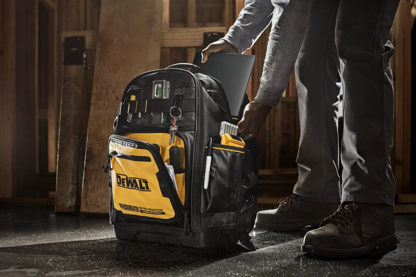 CONSTRUCTION PRO USING DEWALT PROFESSIONAL BACKPACK 