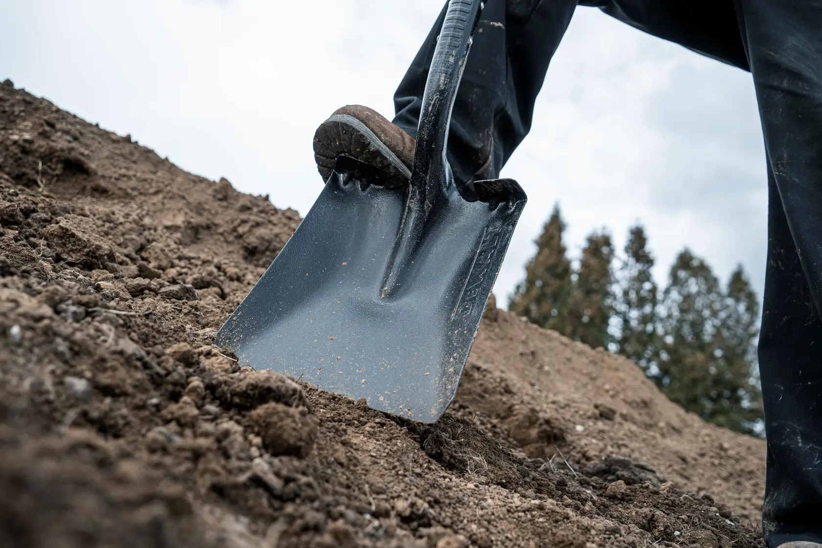 32 inch Fiberglass D-Handle Transfer Shovel close up being pushed into dirt