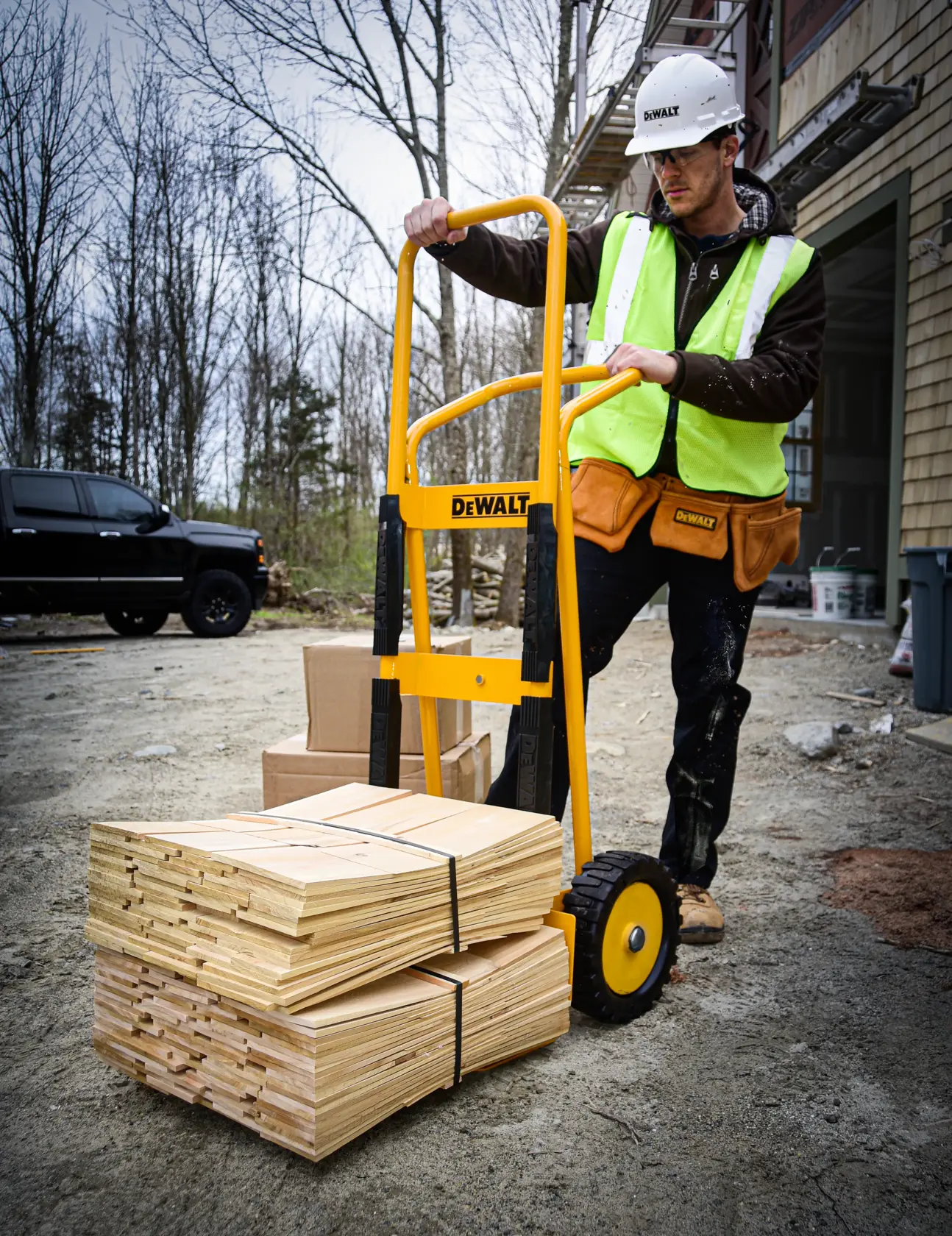 DeWalt DXWT-HT101-KIT Extended Steel Hand Truck with Kit application shot - man using truck