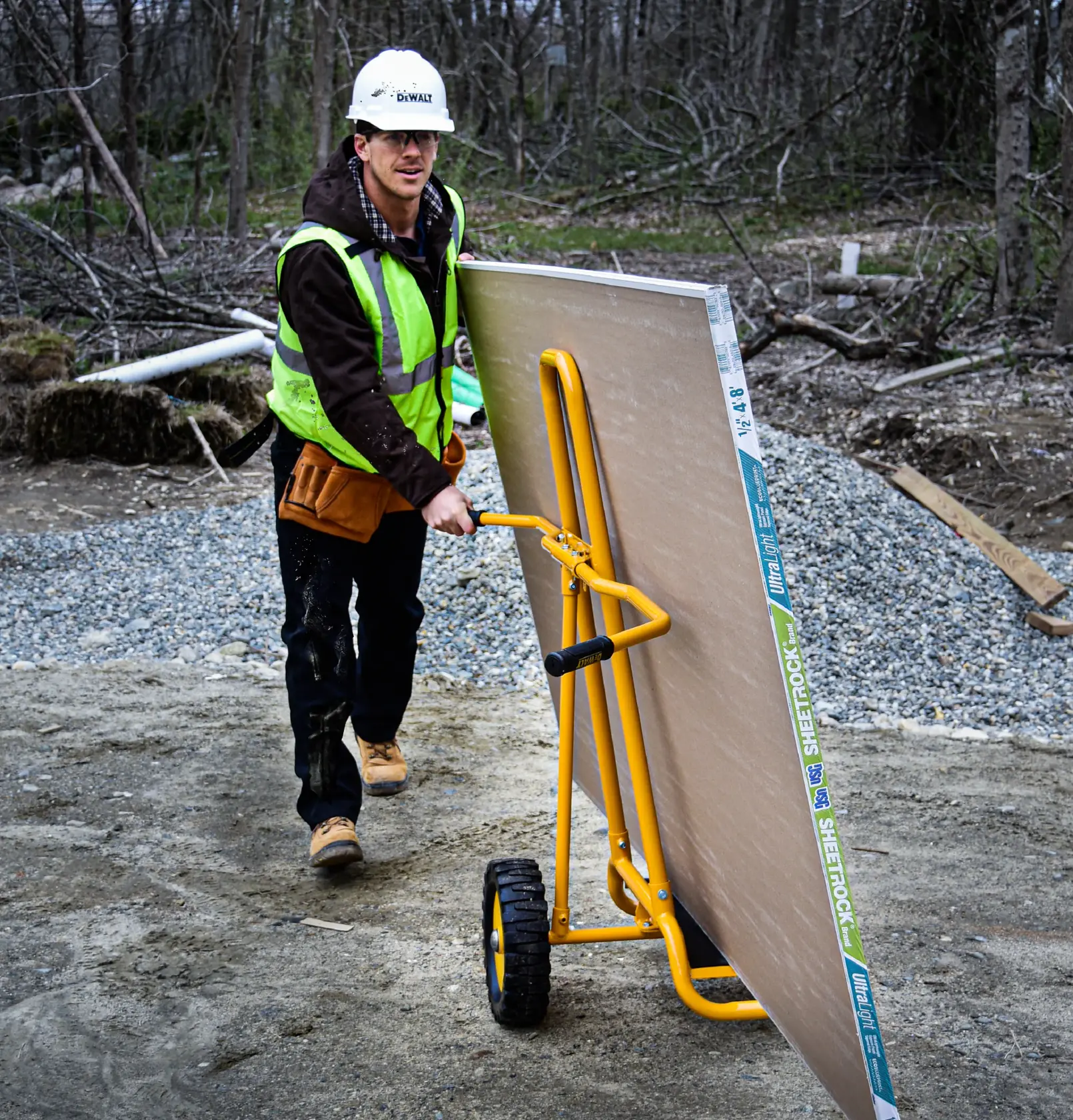 DeWalt DXWT-PS202 Steel Panel Cart application shot - man pushing large board on cart